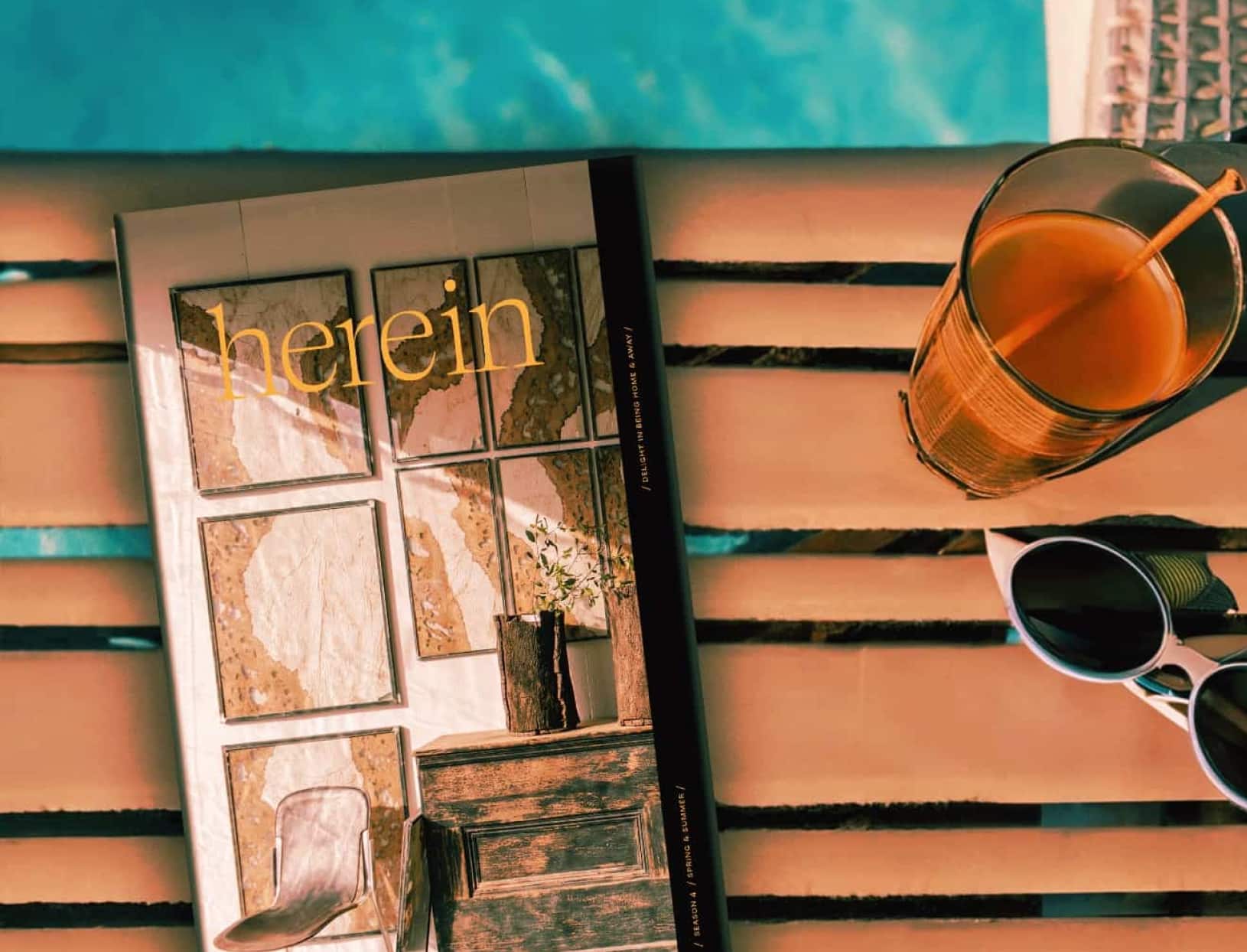 Reading the Herein Magazine poolside